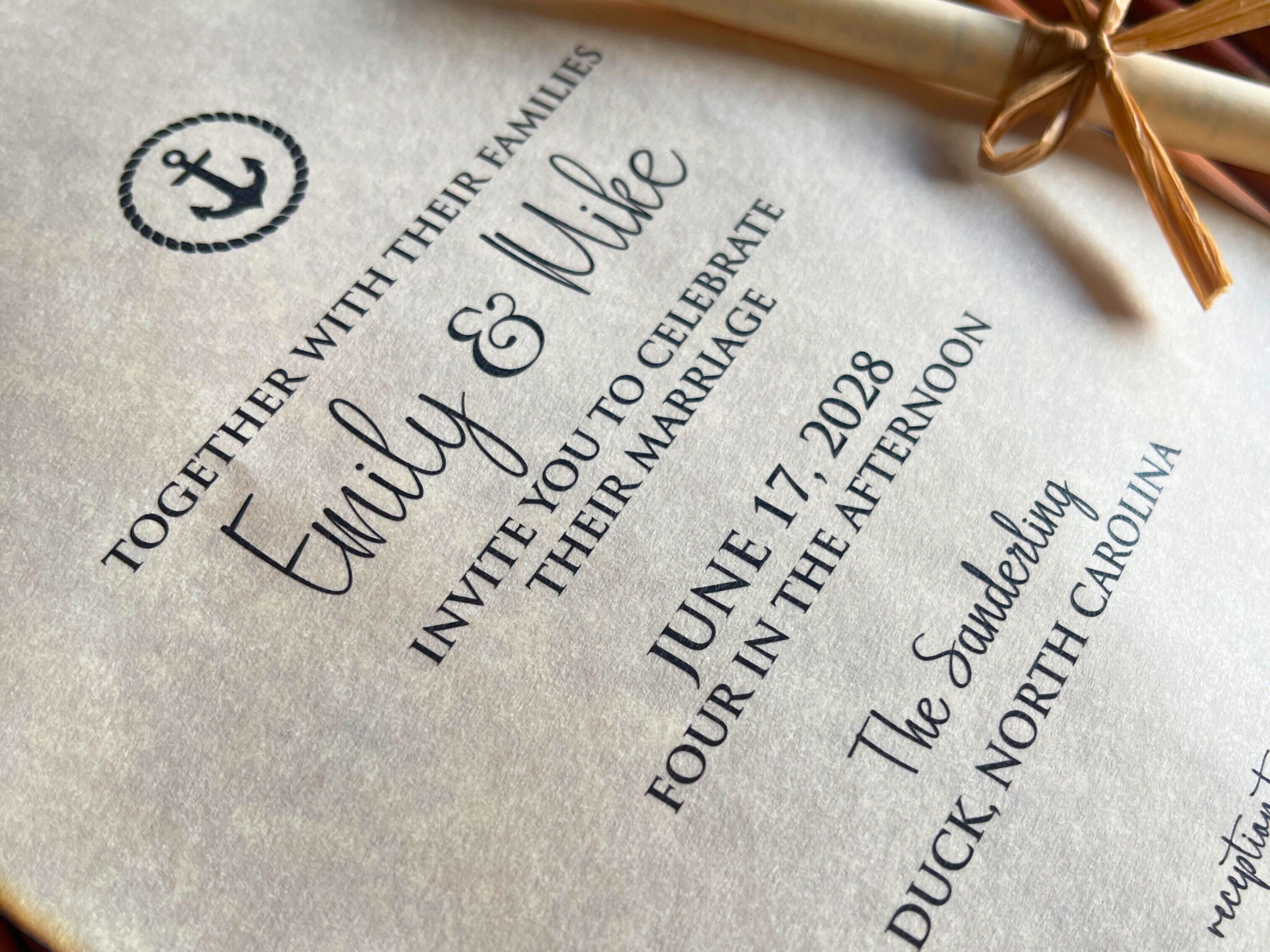 Wedding invitation with anchor logo on textured paper