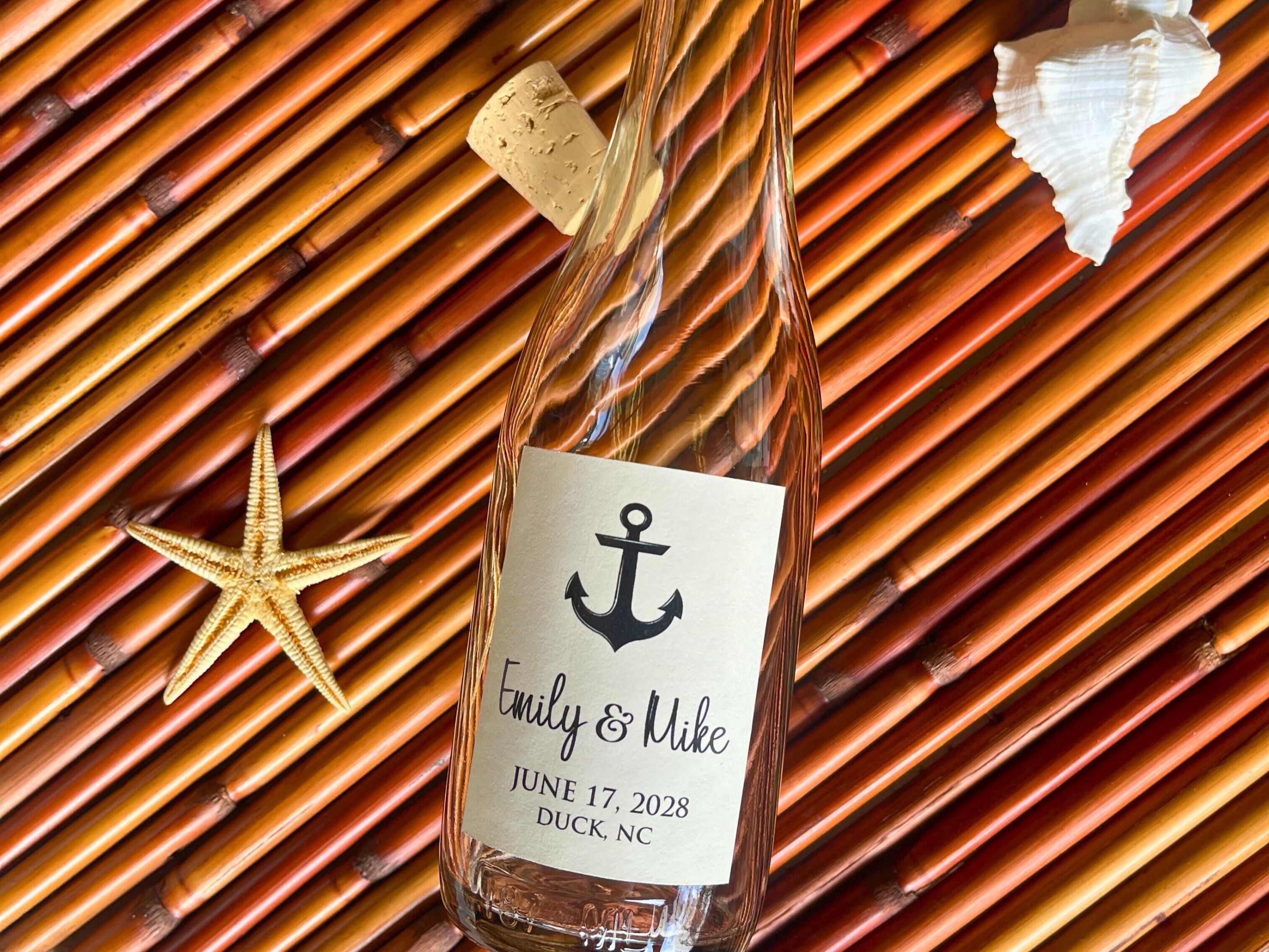 Glass bottle with an anchor label on a textured background