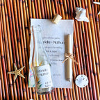 Bird of paradise wedding invitation with tropical florals and lush greenery