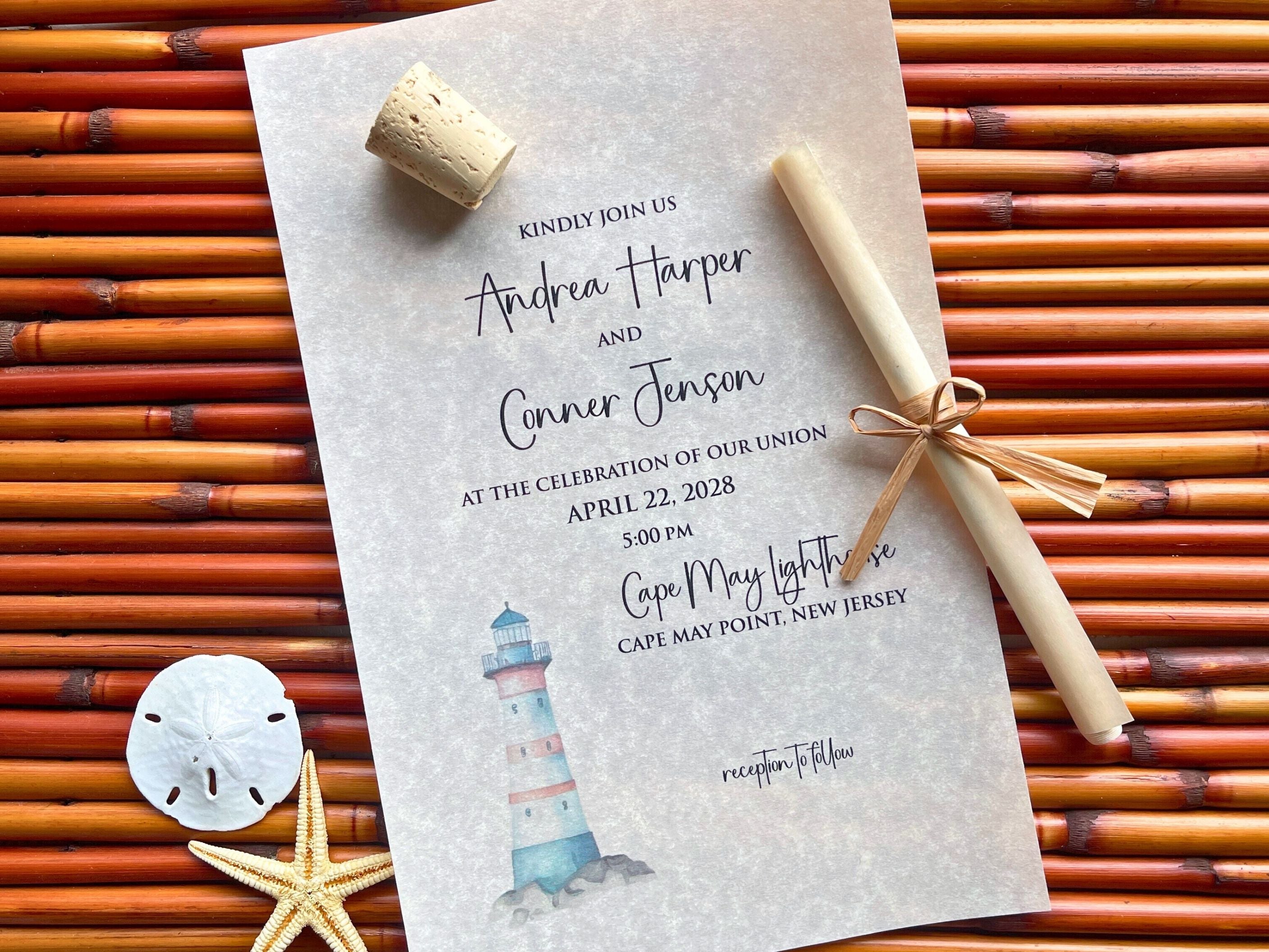 Nautical-themed wedding invitation with lighthouse design on a woven mat background