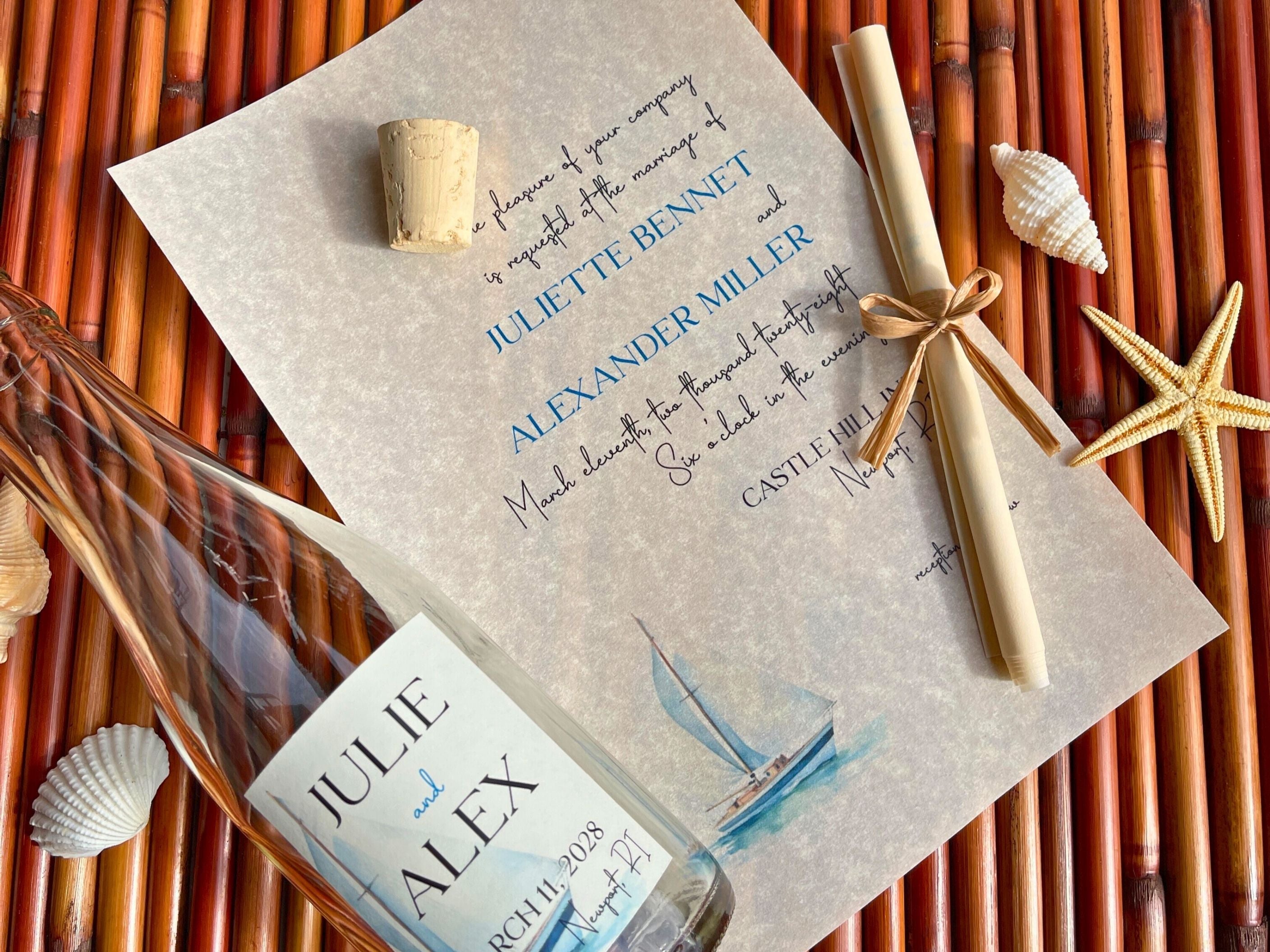 Personalized wedding invitation with bottle, cork, and nautical elements on a woven surface