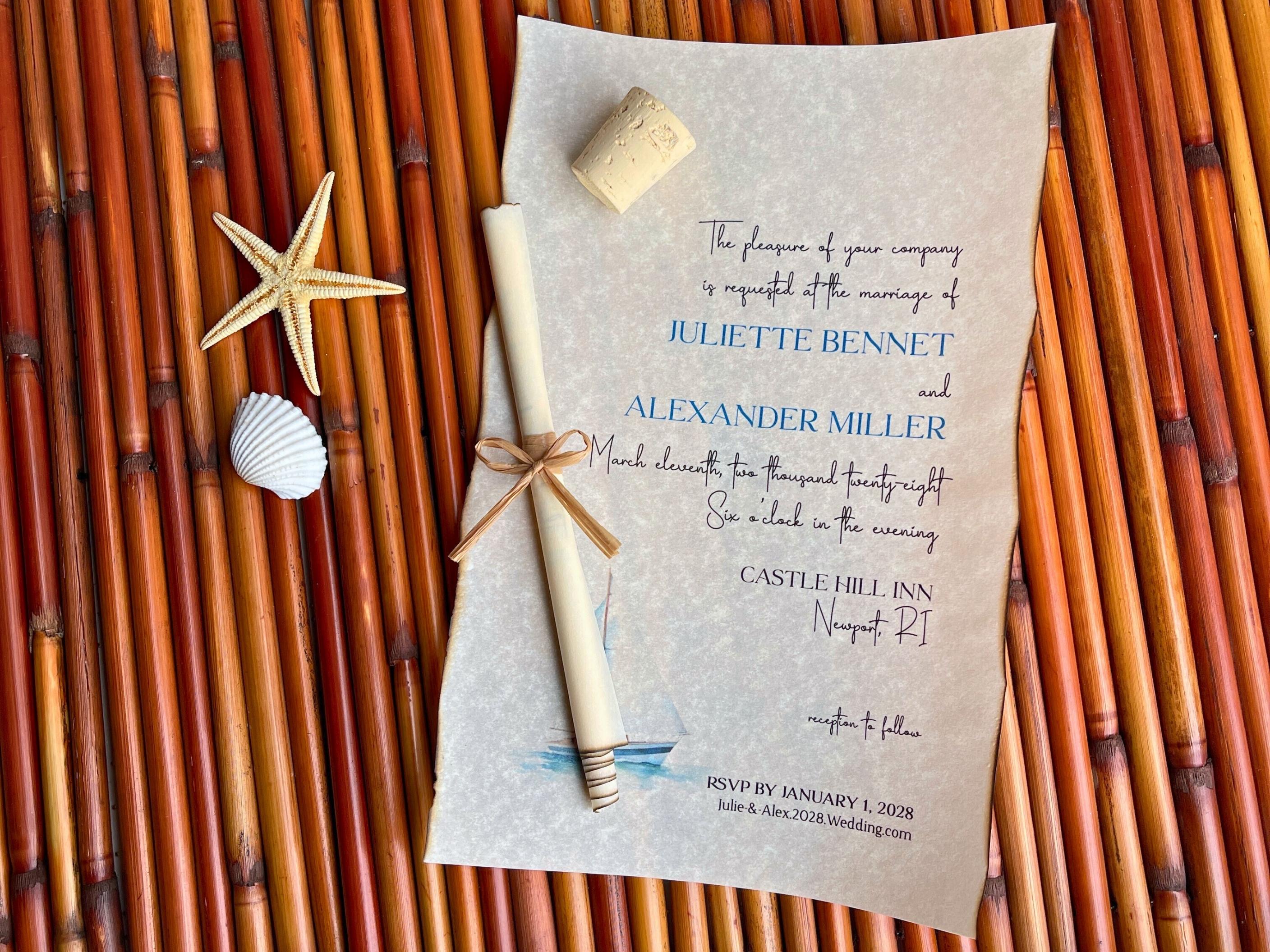 Wedding invitation with a vellum scroll and cork on a bamboo surface