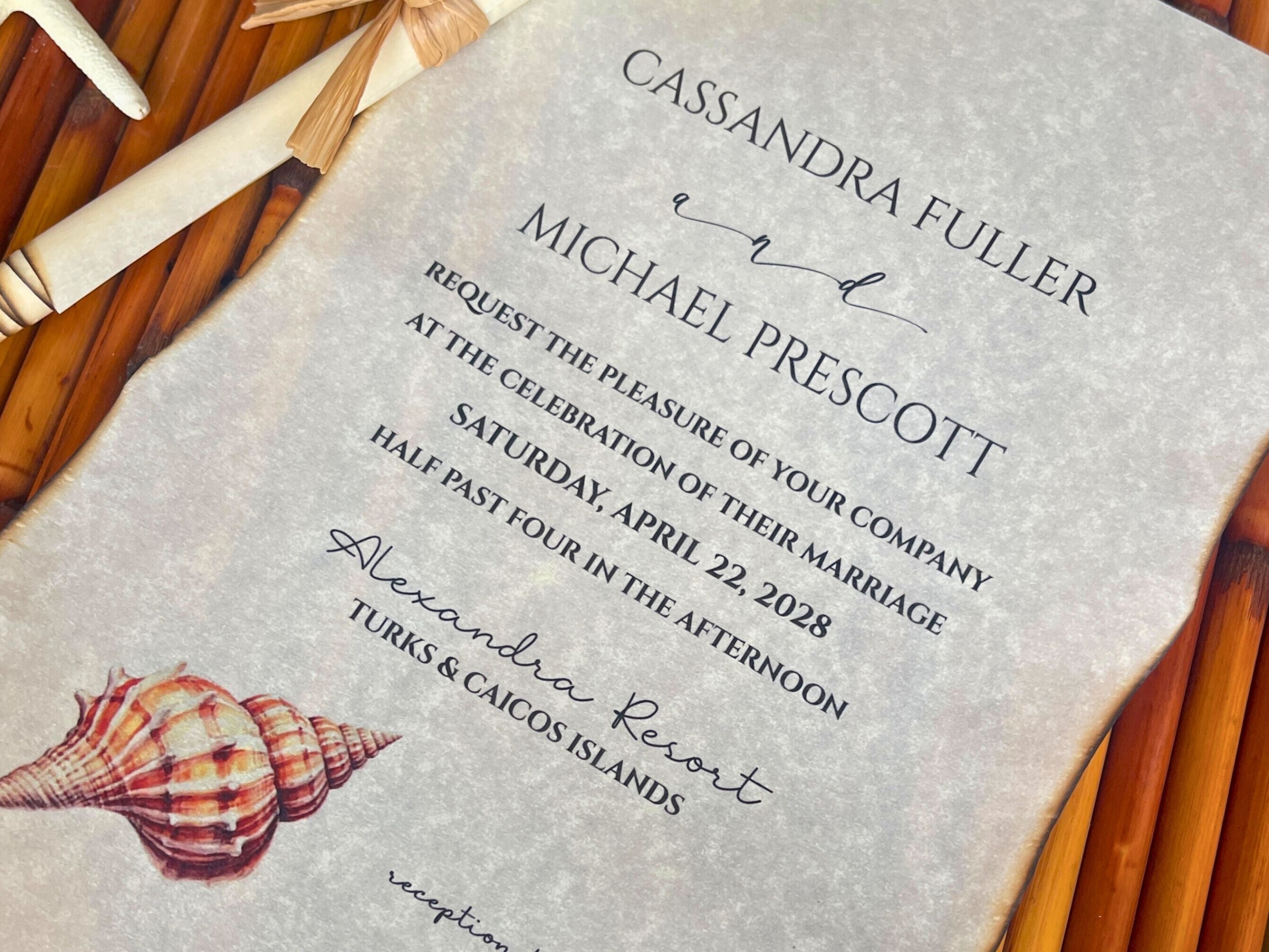 Wedding invitation with shell design on a textured background