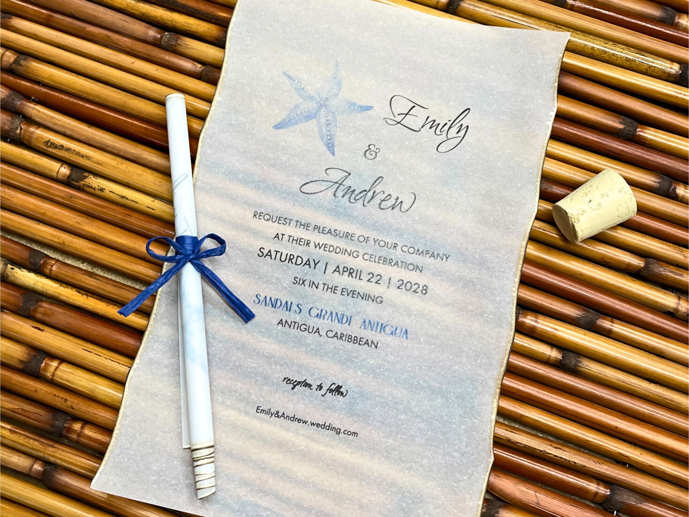 Wedding invitation with a blue ribbon on a woven surface