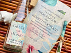 Wedding invitation with bottle Label on a textured surface