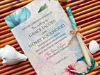Wedding invitation with tropical design on a background of bamboo sticks and shells