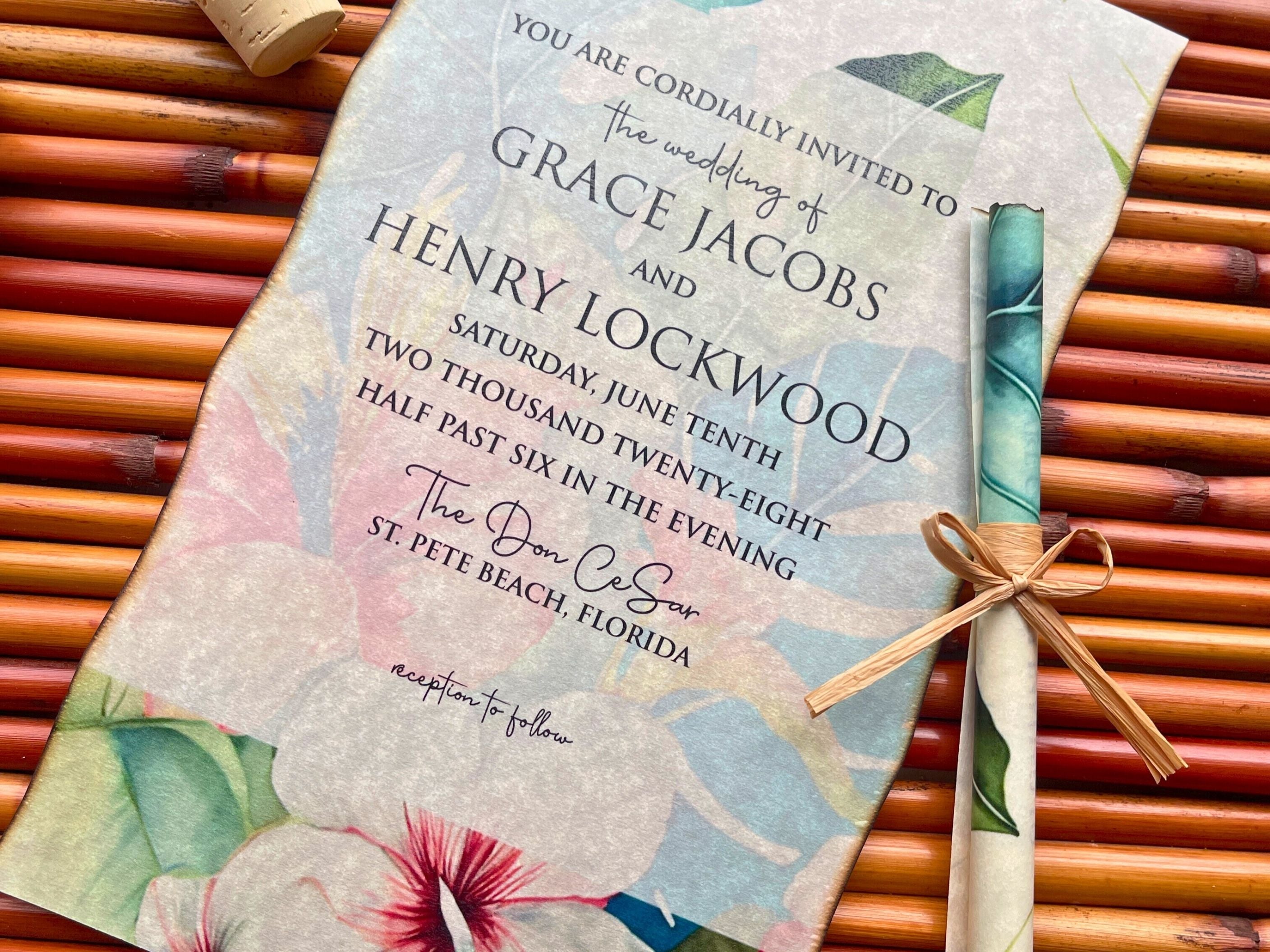Wedding invitation with floral design on a bamboo mat