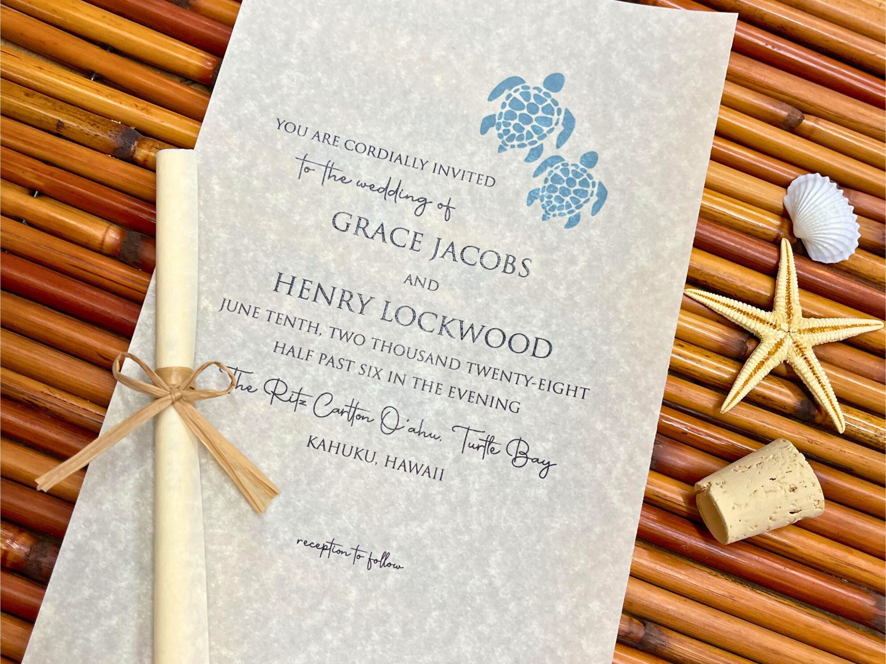 Wedding invitation with turtle design on a textured surface with natural elements.