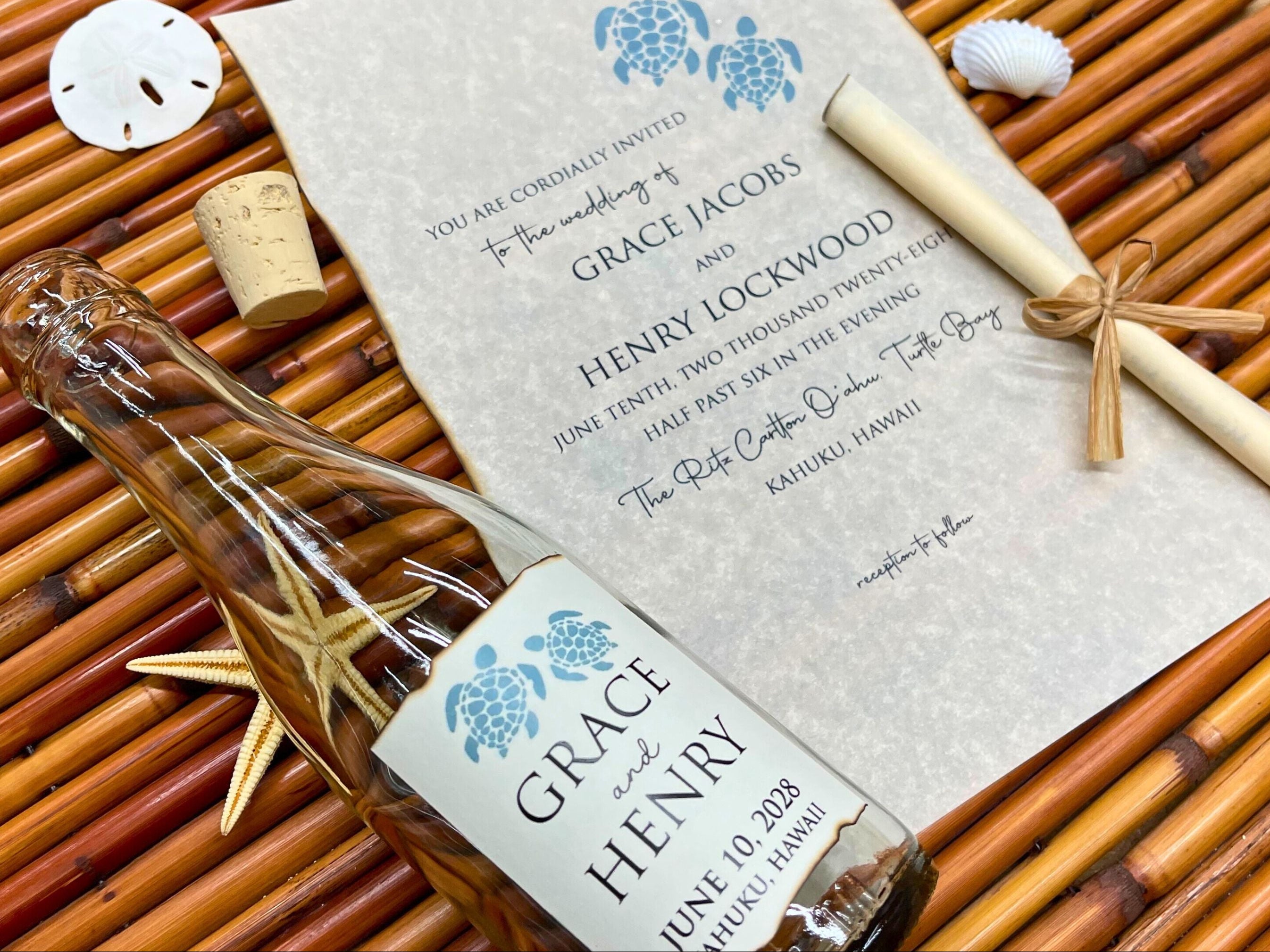 Wedding invitation with bottle and sand dollar on woven mat