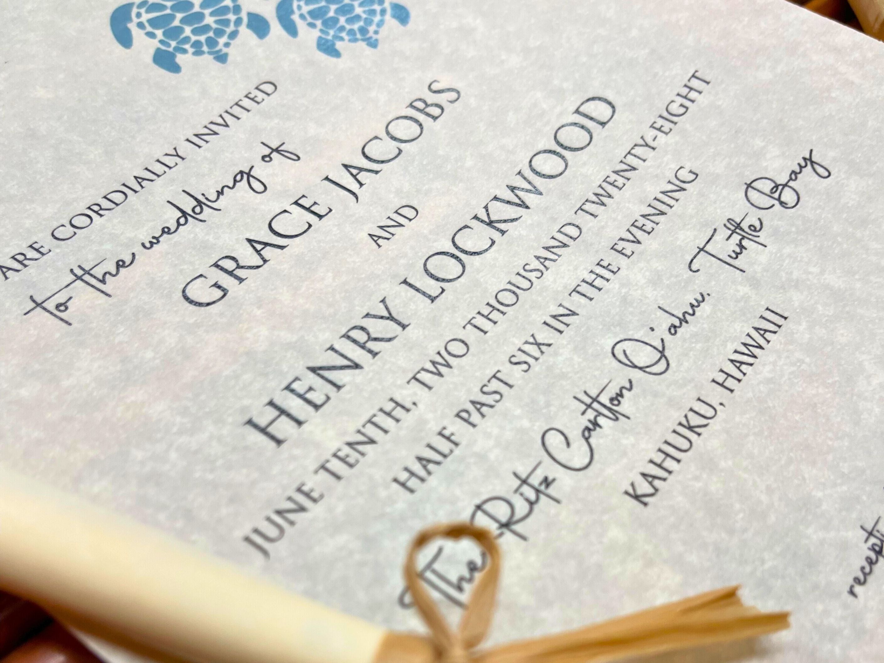Wedding invitation with a blue turtle design  on a textured background