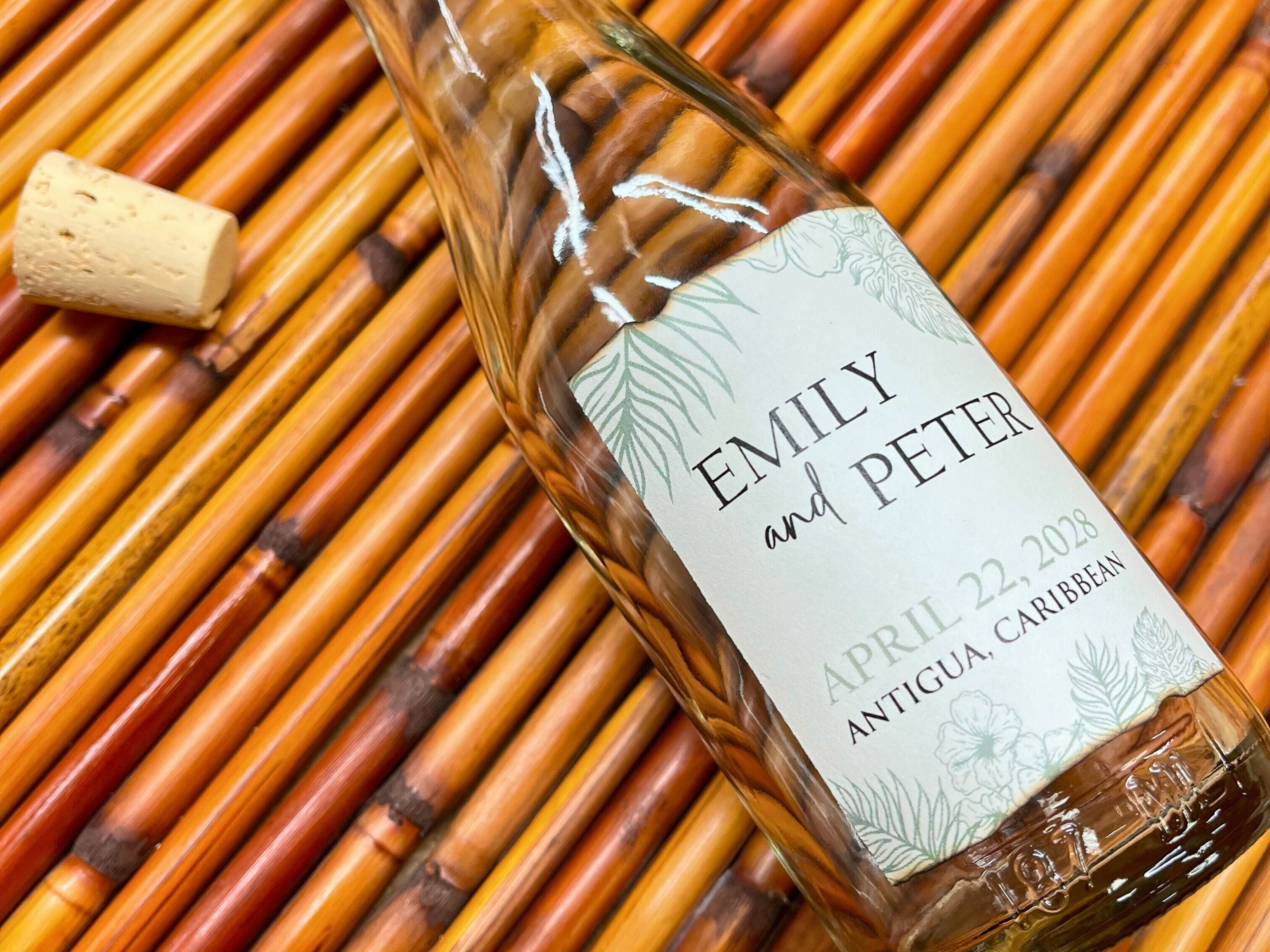 Bottle with a personalized label on a woven mat