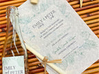 Caribbean theme wedding invitation with green tropical plants